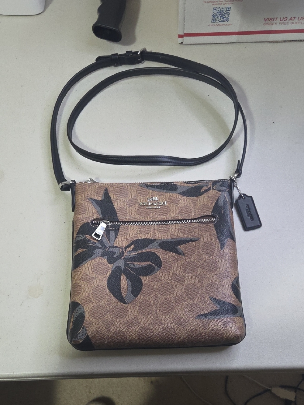 Coach Mini Rowen File  Brown Floral-Print Crossbody with Black Accents